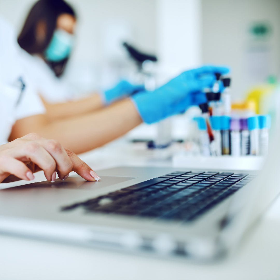 Close-up of medical professionals working in a clinical setting