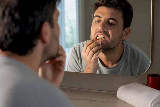 Adult examining chlorhexidine-related tooth staining