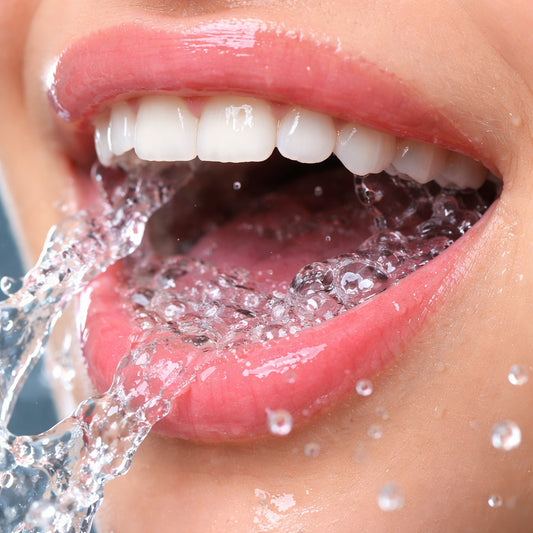 mouth rinse before brushing