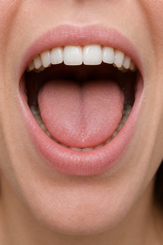 A photorealistic close-up of a clean, dry mouth with tongue slightly lifted, ready for a spray. Alt: Clean mouth after brushing ready for CBD oral spray